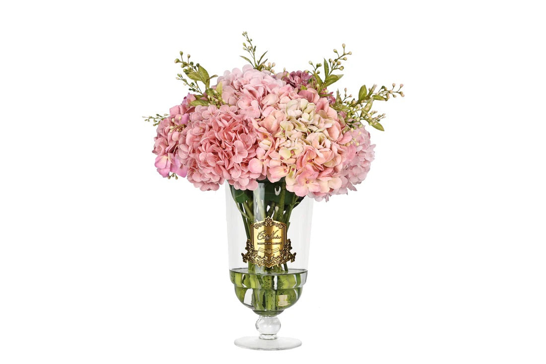 Bouquet de fleurs réalistes roses dans un vase en verre à pied avec gel et plaque dorée Côte Noire