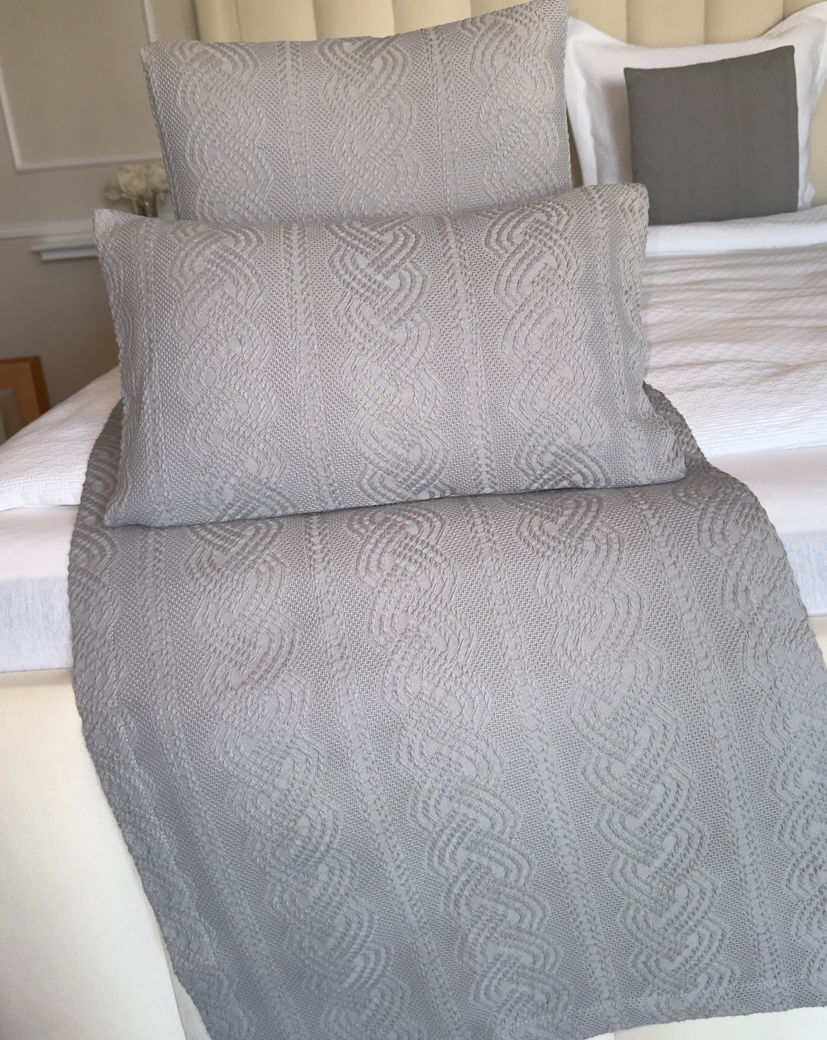 Coussin décoratif tressé gris
