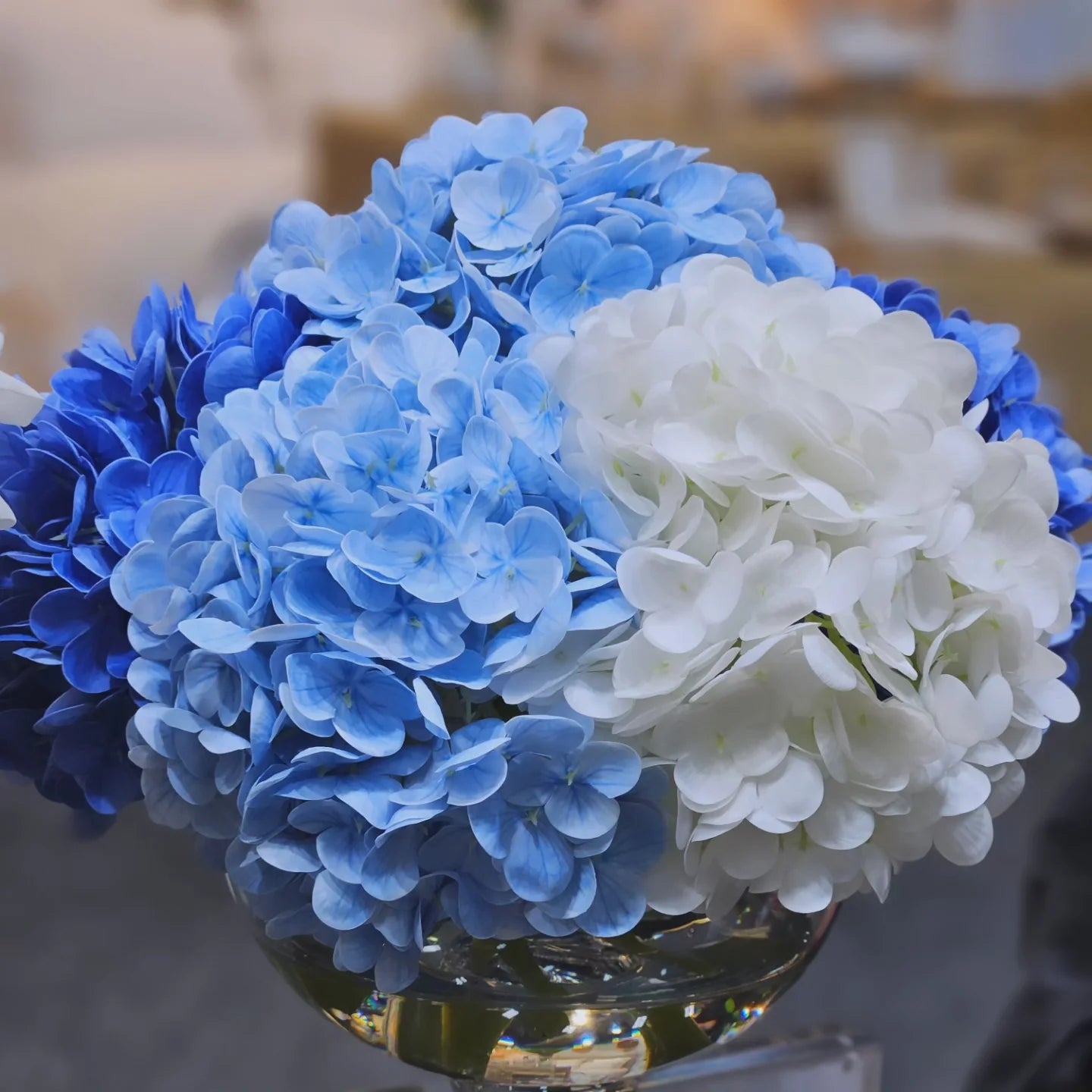 Medium bouquet of blue hydrangea with silver badge